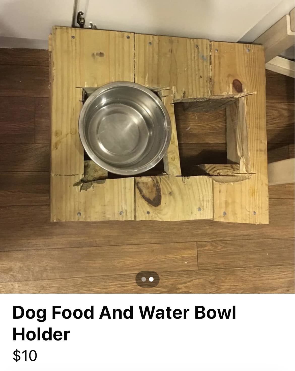 Very roughly constructed wooden dog bowl holder on sale for $10