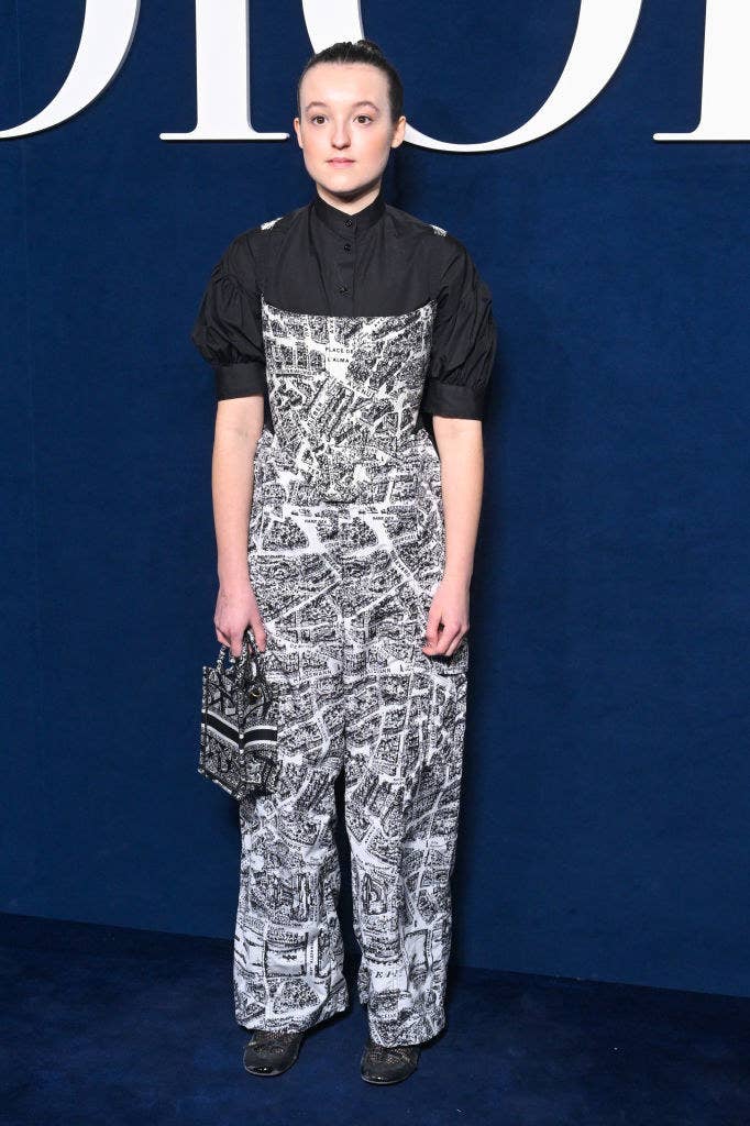 Bella in patterned overalls and a short-sleeved top