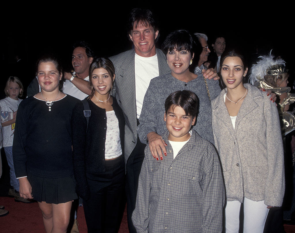 Kim with sisters Khloé and Kourtney, brother, and parents