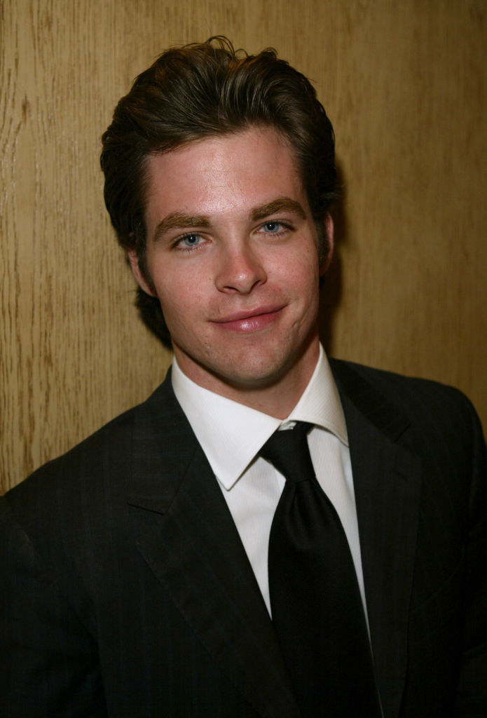Close-up of Chris in a suit and tie