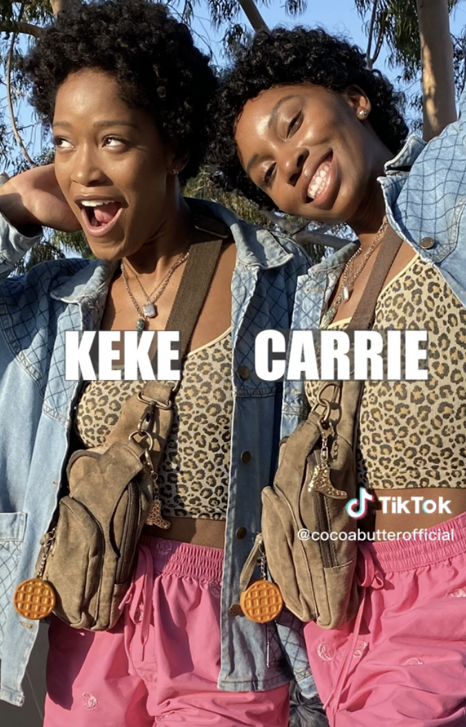 Carrie standing next to Keke Palmer wearing the same outfit on the set of "Nope"