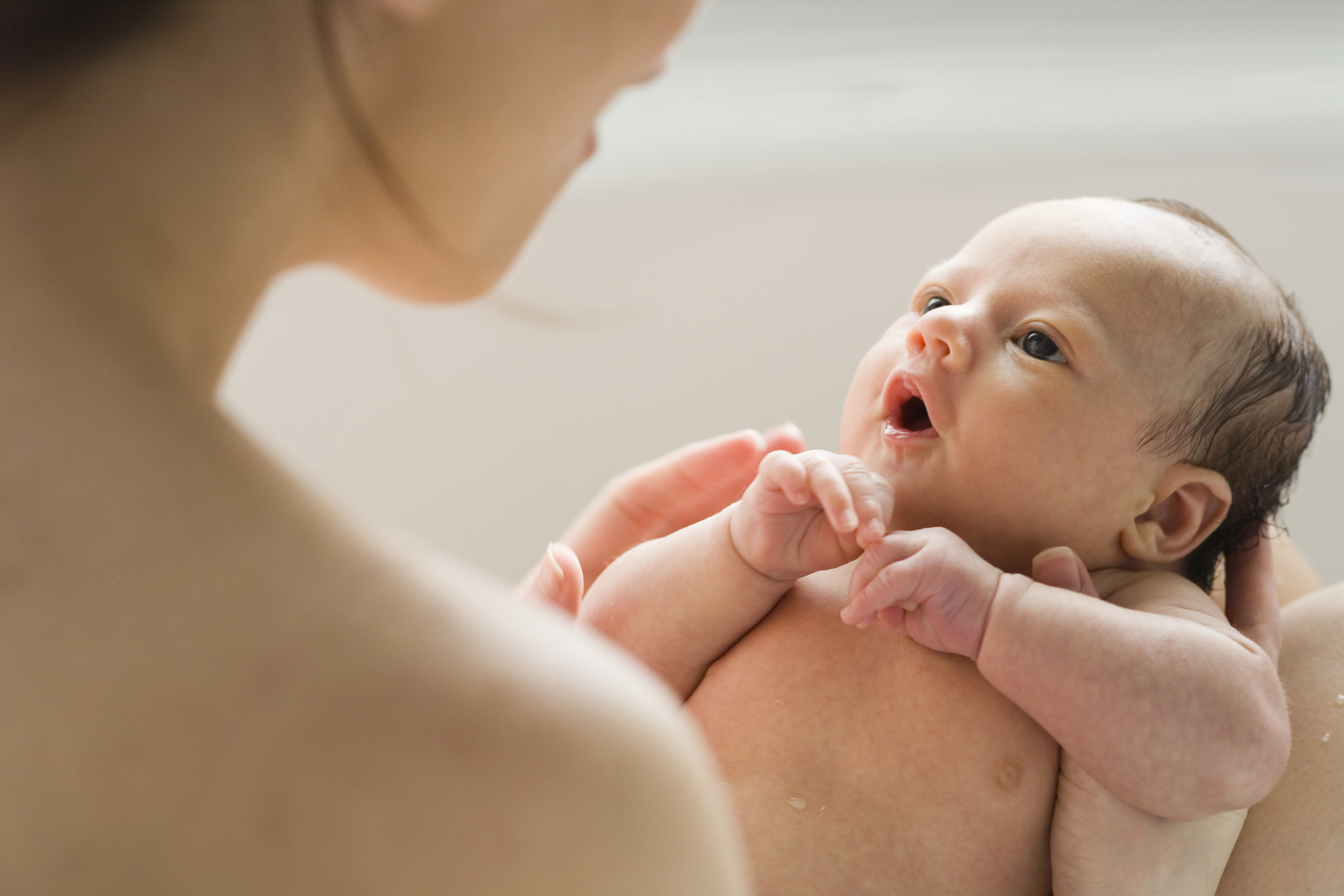 mom holding infant