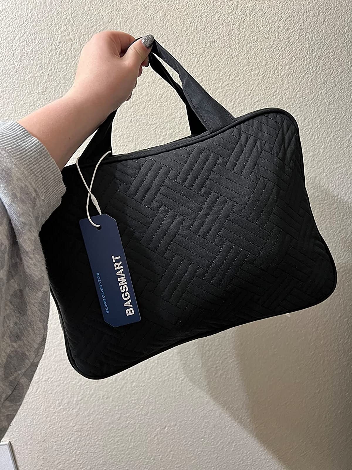 Reviewer's photo of the toiletry case in the color Black, closed