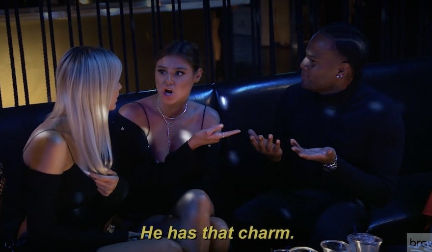 Lala, Raquel, and Oliver sitting next to each other on a couch at a nightclub