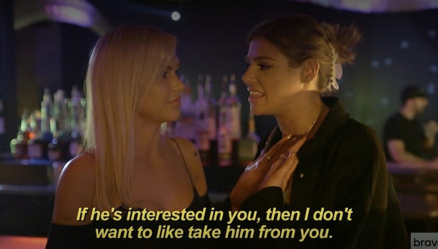 Lala and Raquel having a conversation at a nightclub