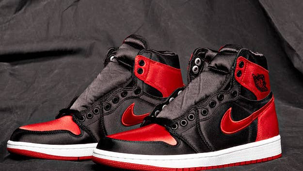 Jordan Brand is reportedly releasing the original black-and-red ("Bred") Air Jordan 1 in satin form for women during the Holiday 2023 season. Click for info.
