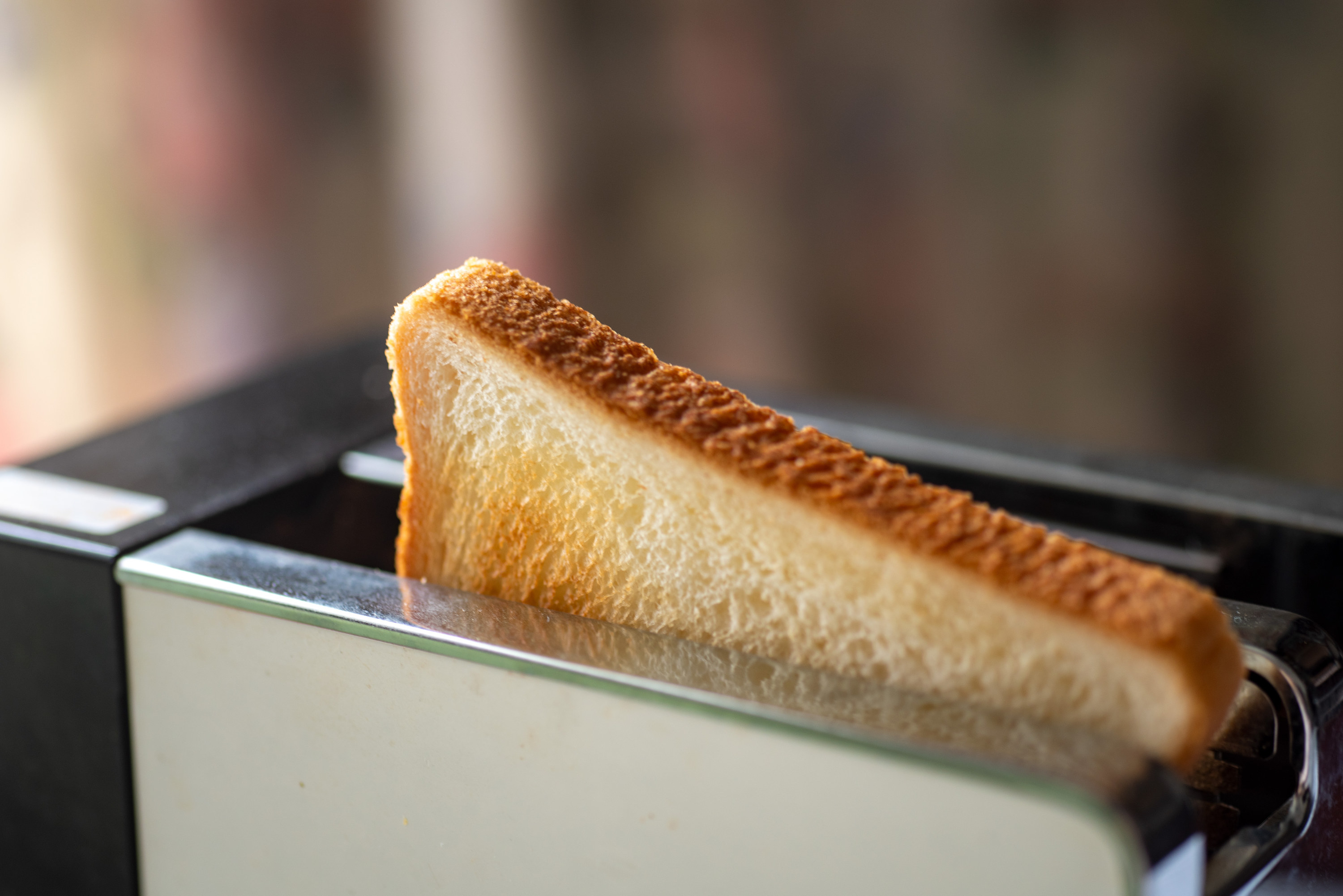 toast coming out of a toaster