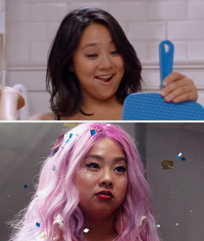 Above, a closeup of Stephanie holding a mirror upside down in Girl Code; below, a closeup of her in a pink wig and bejeweled makeup in Everything Everywhere All At Once