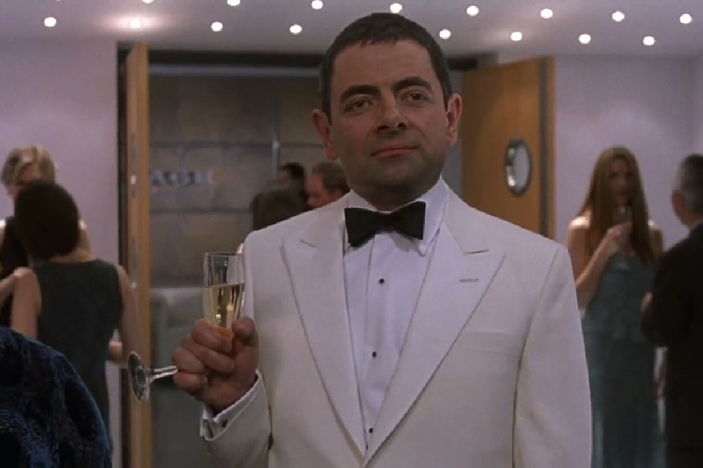scene from the movie where Johnny is in a tux with a drink in his hand