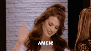 A woman slapping a table and saying Amen