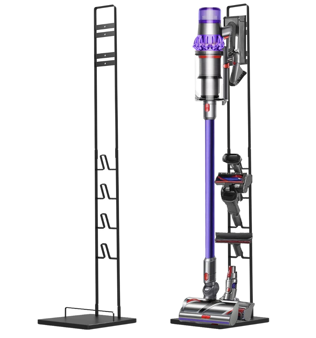 the vacuum stand holding a dyson and its accessories