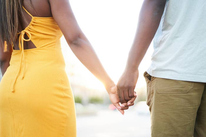 closeup of people holding hands