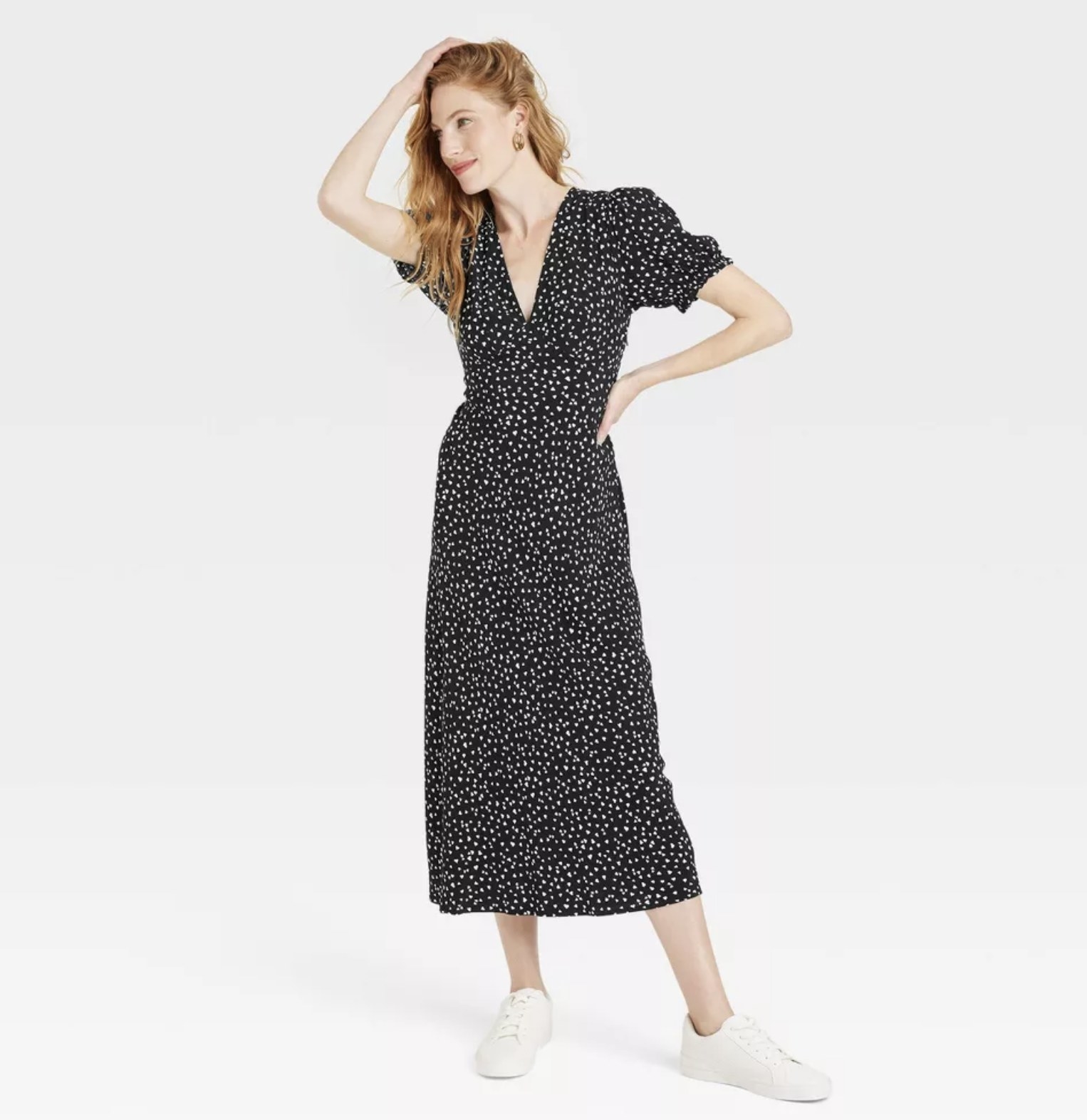 the midi dress with a black and white heart print