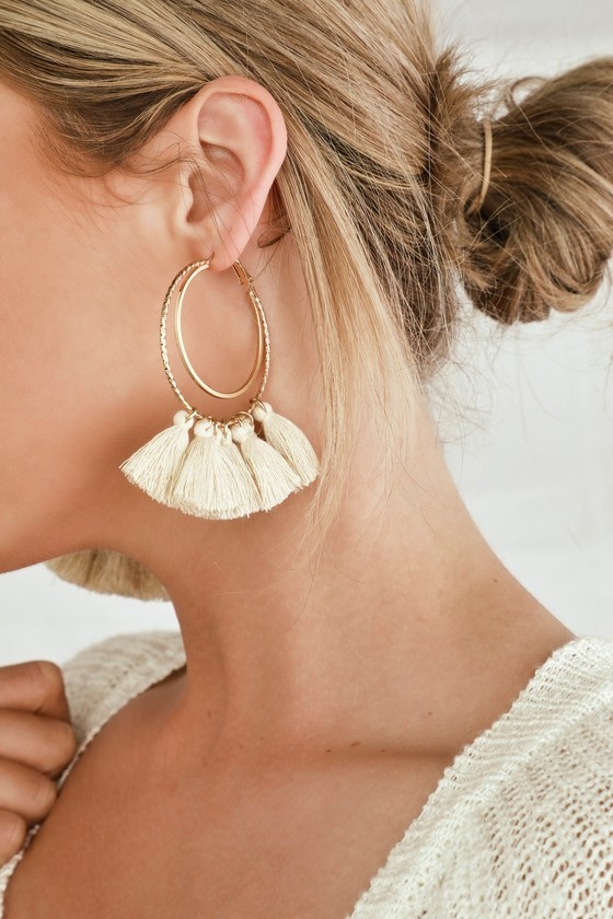 Image of model wearing the hoop earrings