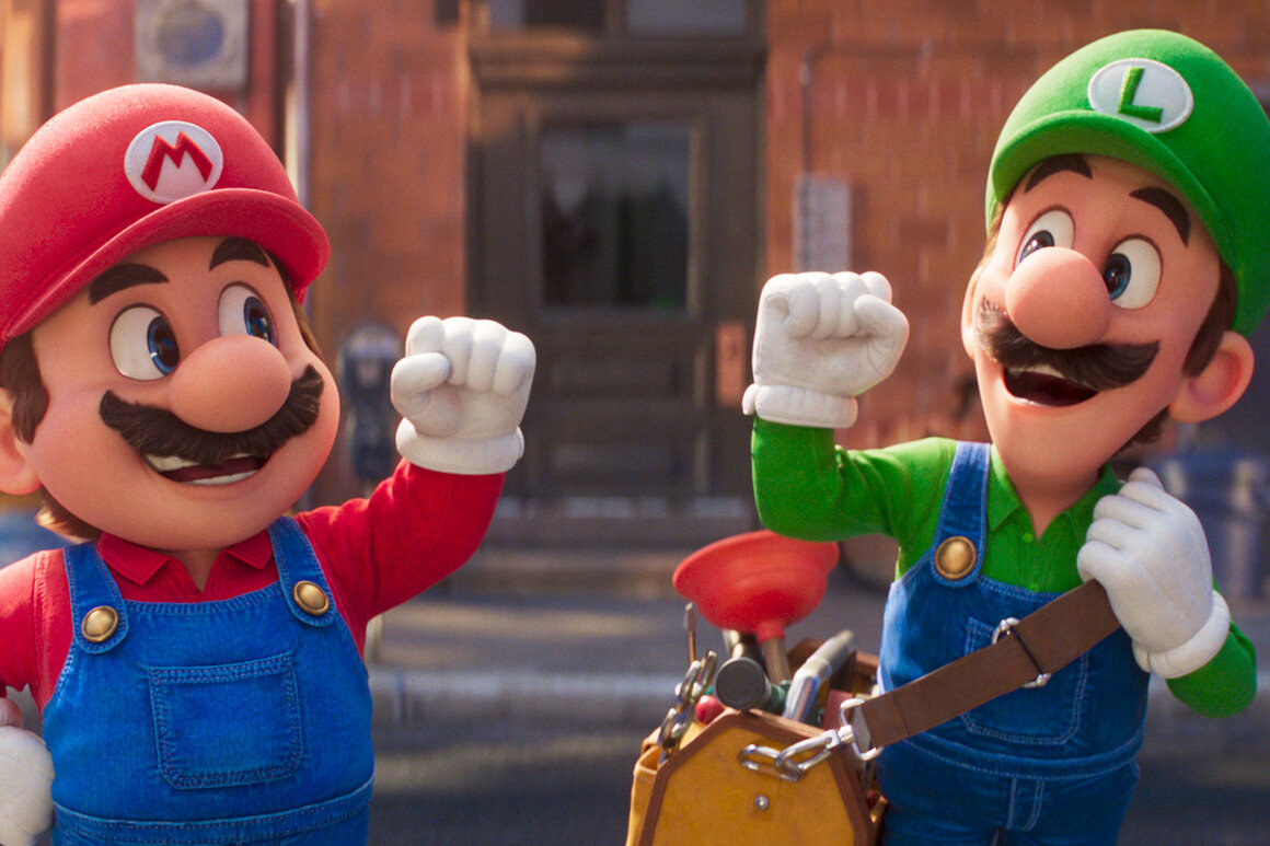 Mario and Luigi fist bumping
