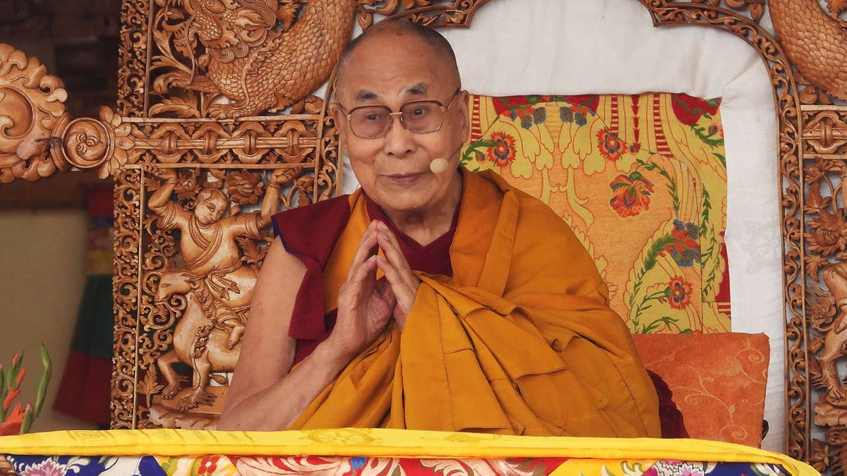 The Dalai Lama has issued an apology after a video showing him kissing a child and asking him to “suck” his tongue at an event in India sparked outrage online.