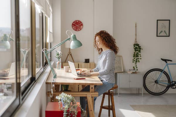 A woman working on a laptop