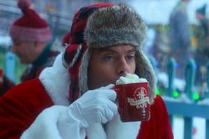 Bill Hader drinking a hot chocolate as Nick in Noelle