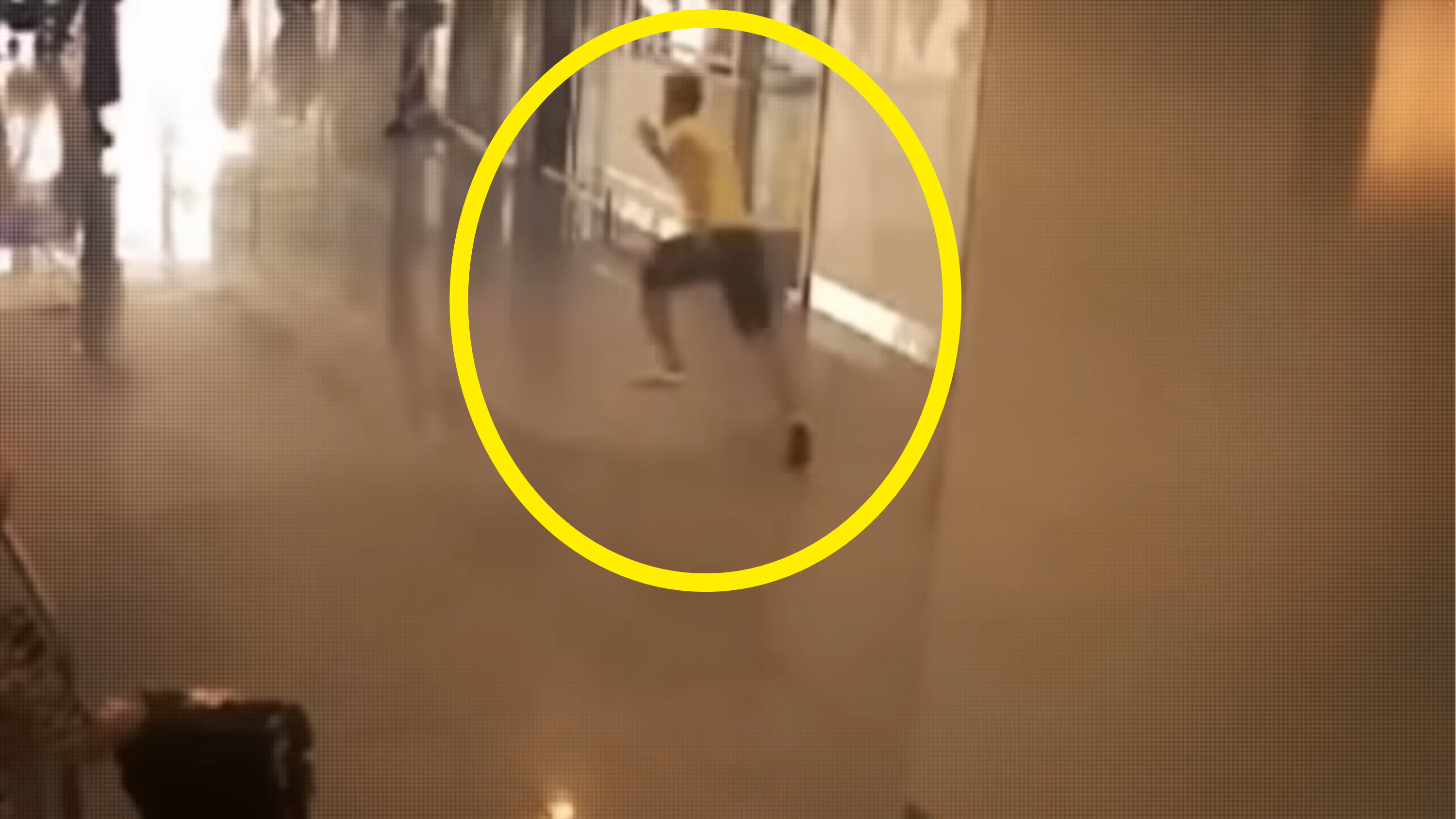 CCTV footage of Lars running down the hallway