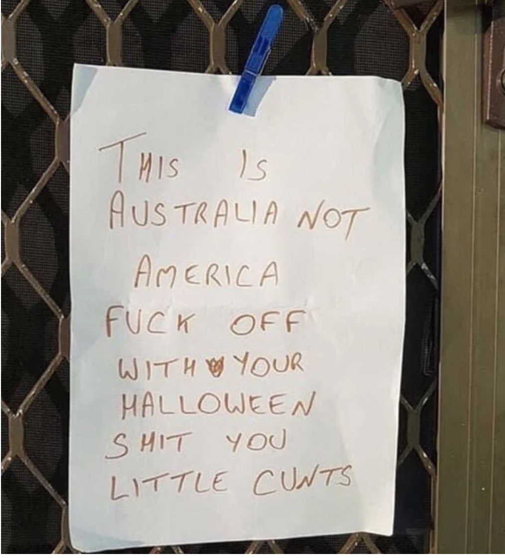 A note taped to a front door reads &quot;this is Australia not America, fuck off with your Halloween shit you little cunts&quot;