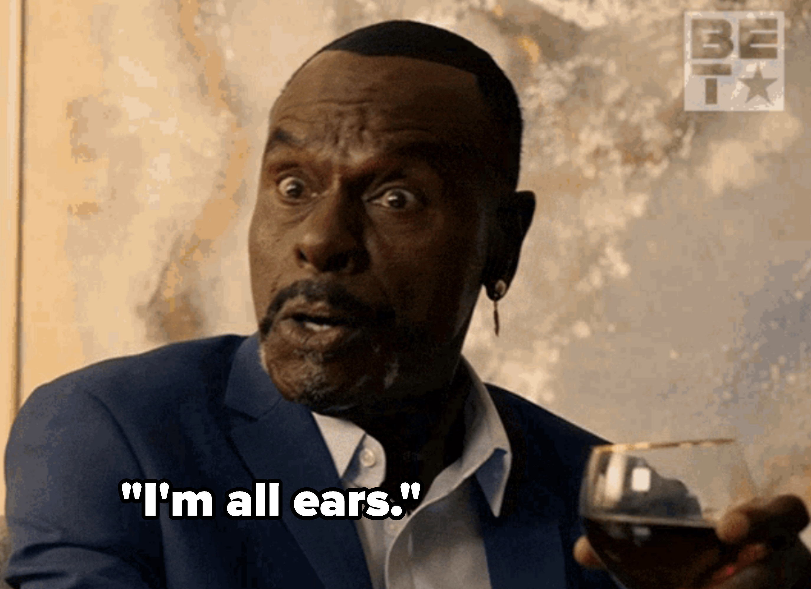 A man saying, &quot;I&#x27;m all ears.&quot;