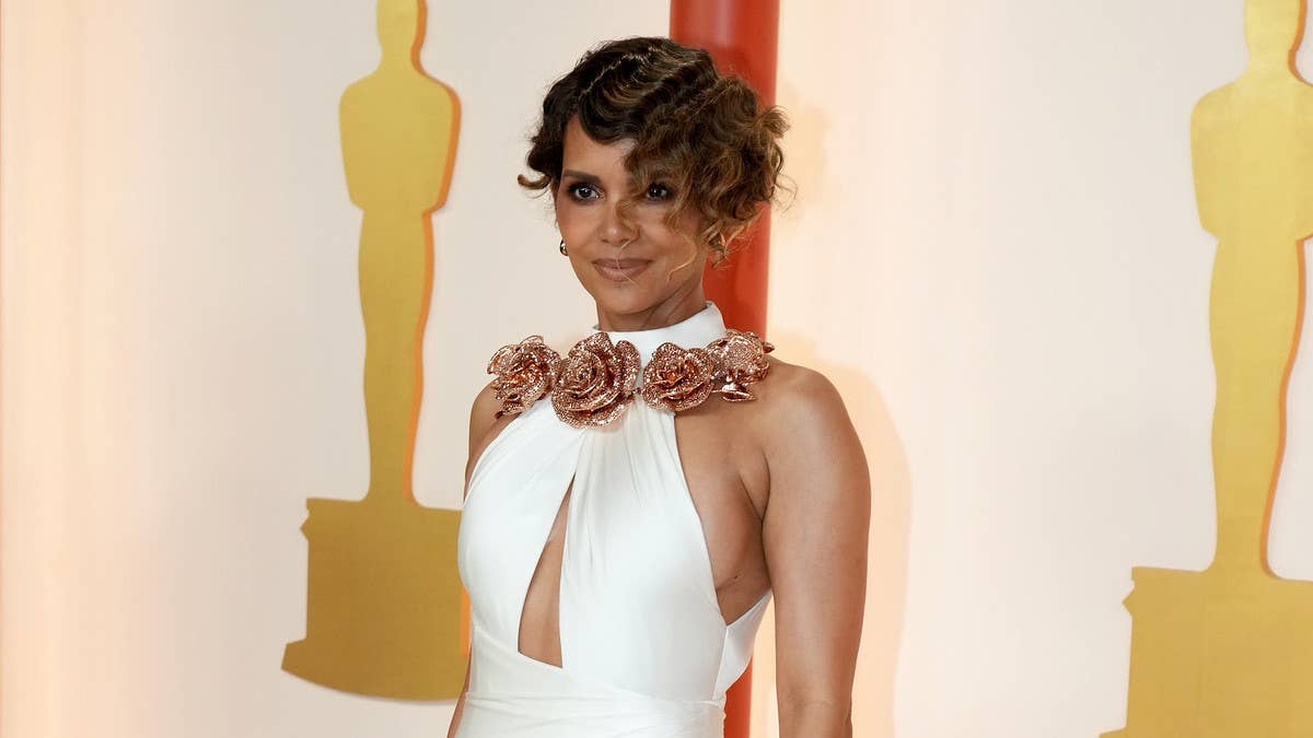 Halle Berry shut down a troll who had a negative take on her latest Instagram photo. The pic featured Berry nude while drinking wine on a balcony.