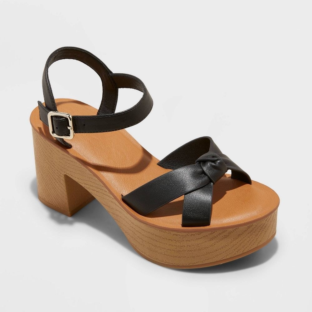 sandals with black straps and a block heel
