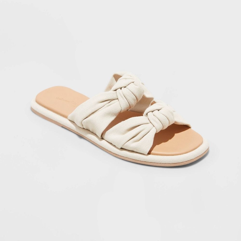 flat sandals with double beige bows