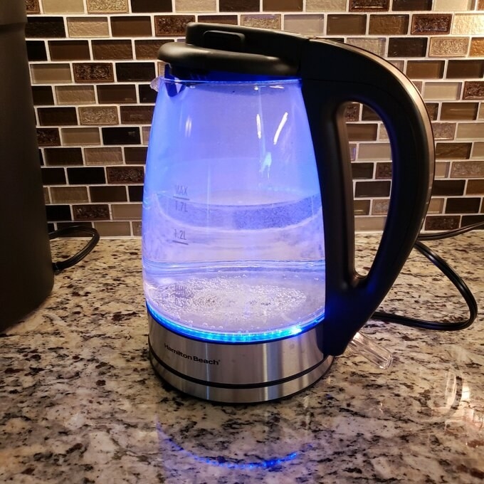 The kettle lit up on a counter