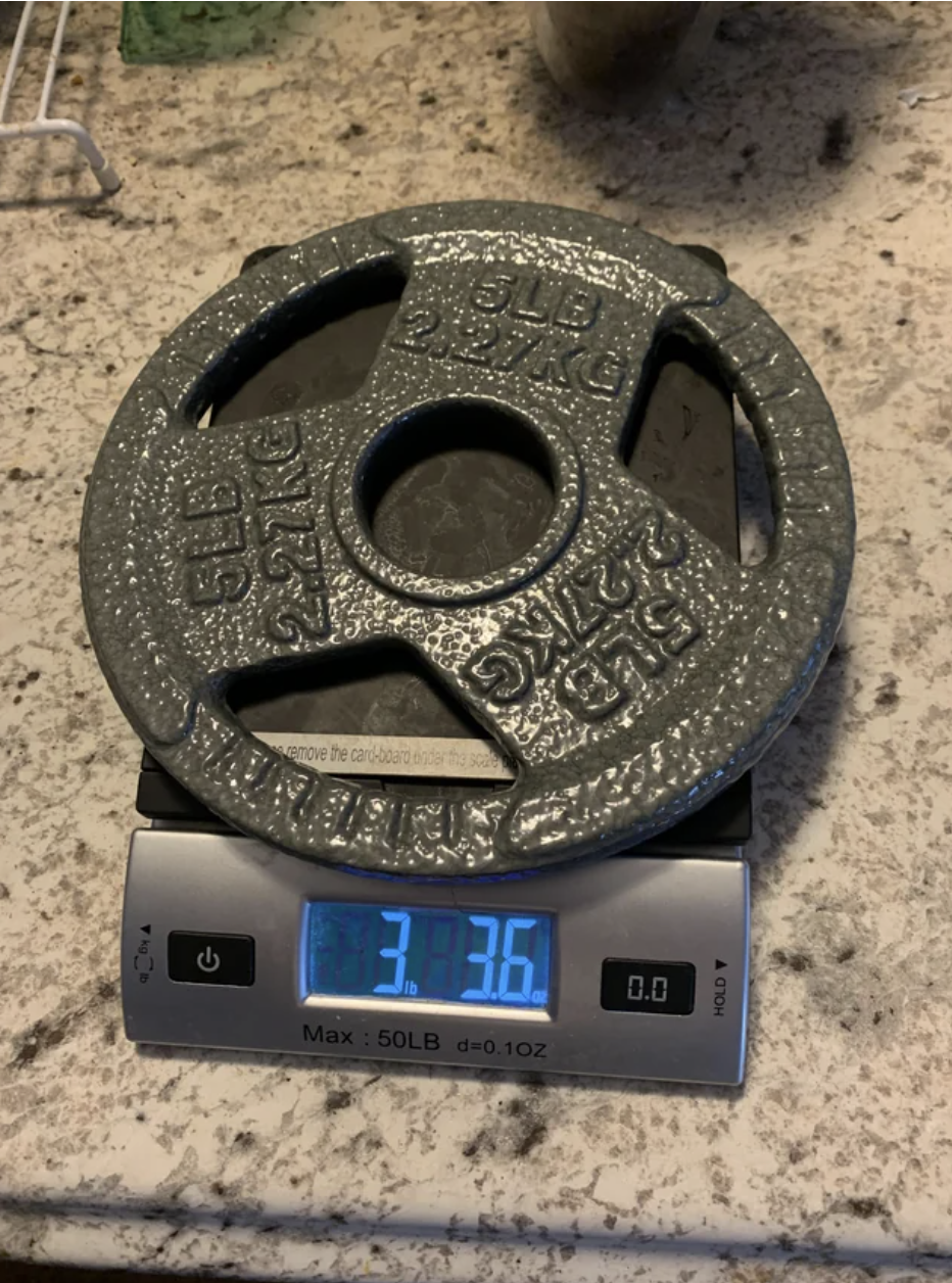 A 5-lb. weight weight 3.36 Ibs