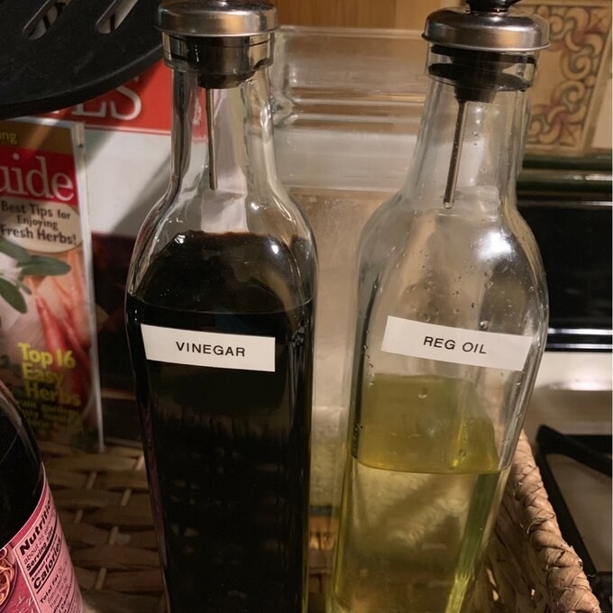 The oil and vinegar labeled and on display