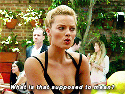 Margot Robbie saying sarcastically with raised eyebrows, &quot;What is that supposed to mean?&quot;