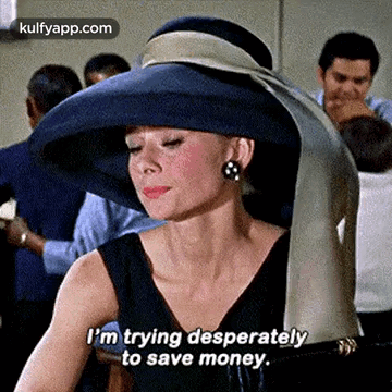 Holly Golightly saying &quot;I&#x27;m trying desperately to save money&quot; in &quot;Breakfast at Tiffany&#x27;s&quot;