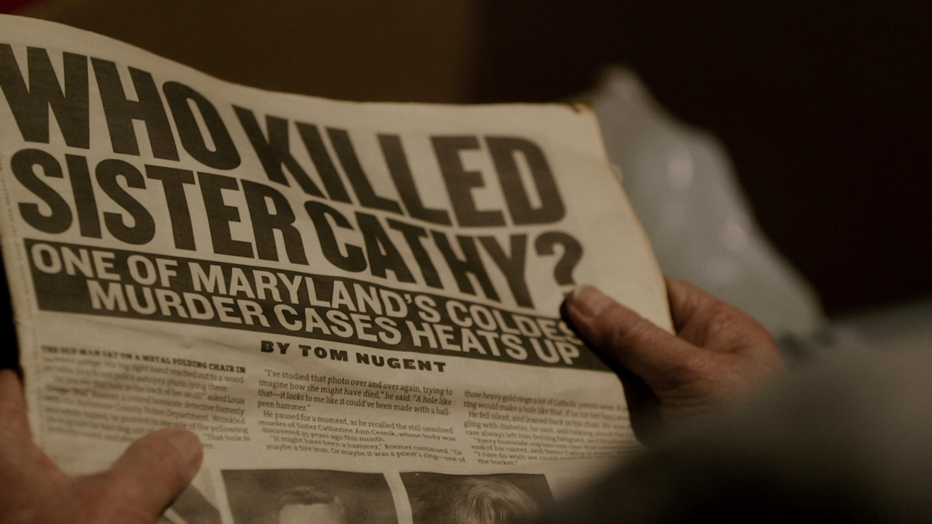 A newspaper reading &quot;WHO KILLED SISTER CATHY?&quot;