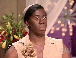 Camera zooming in on a person with a shocked look on their face