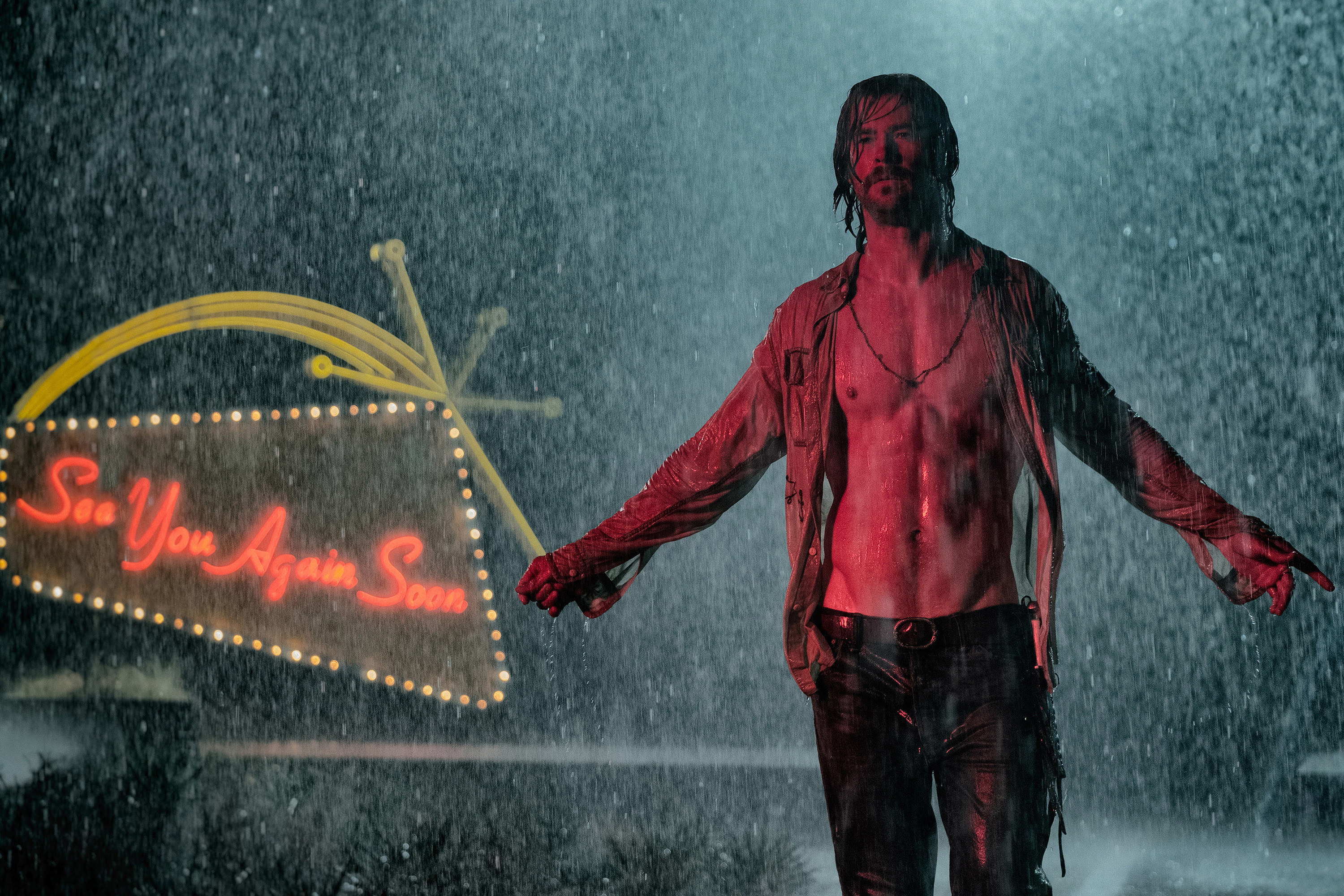 Chris Hemsworth, shirtless, in the rain
