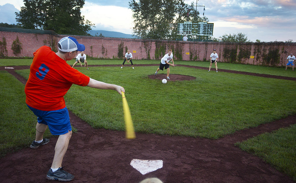 People playing Wiffle Ball