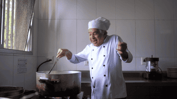gif of chef dancing in the kitchen