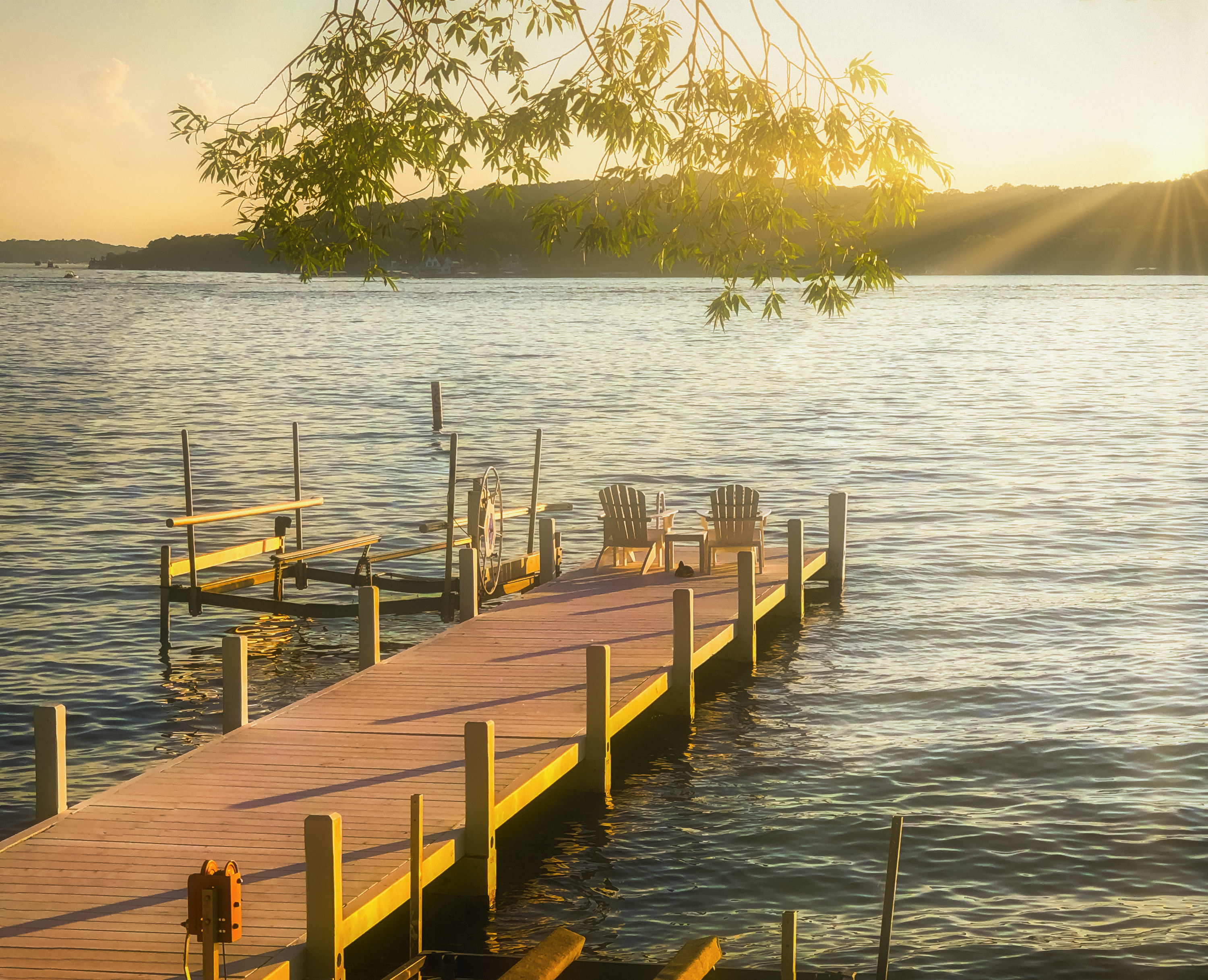 A dock on a lake is pictured on a summery sunny day in Wisconsin
