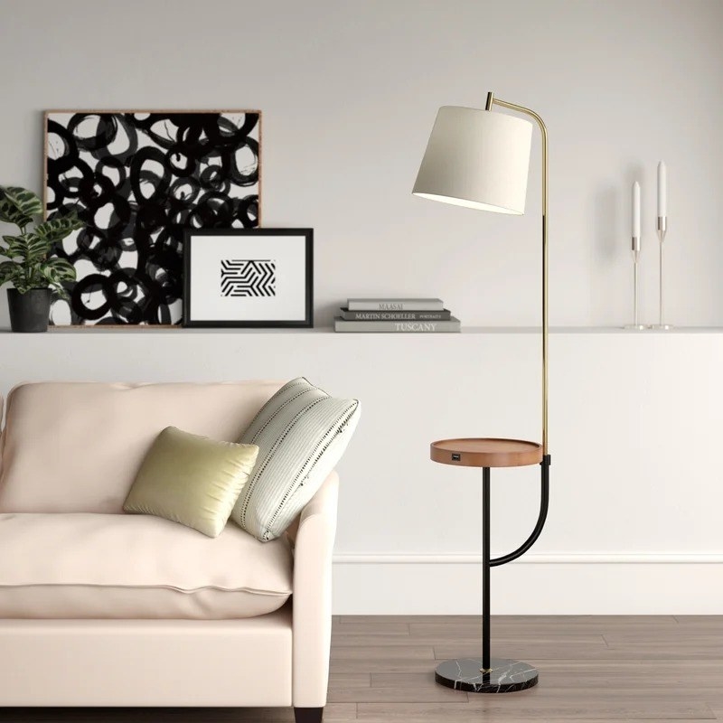 the black, white brass and wood lamp