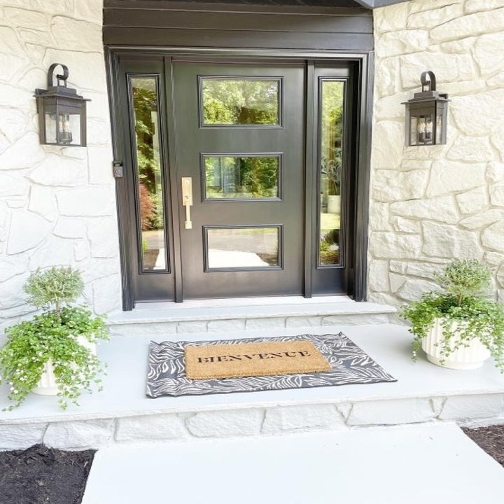 two planters on a porch