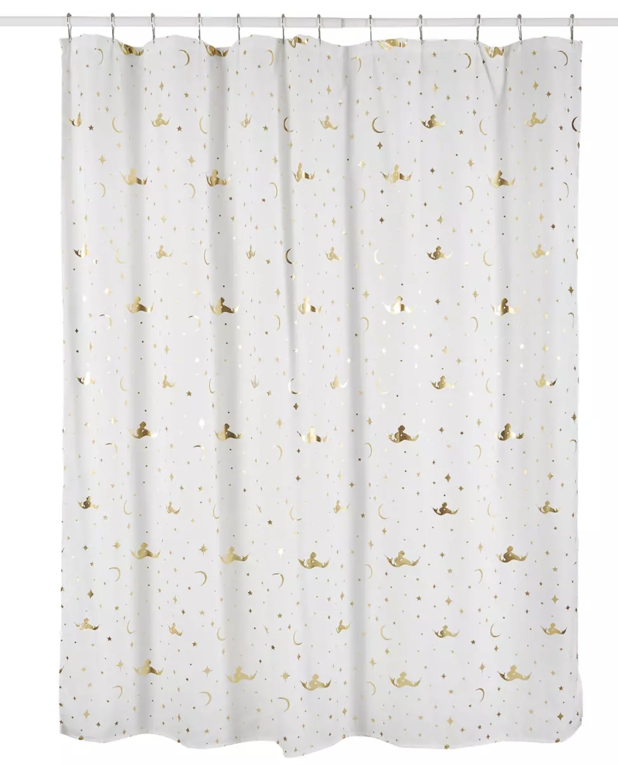 The white curtain with gold stars, moons, and magic carpet decals
