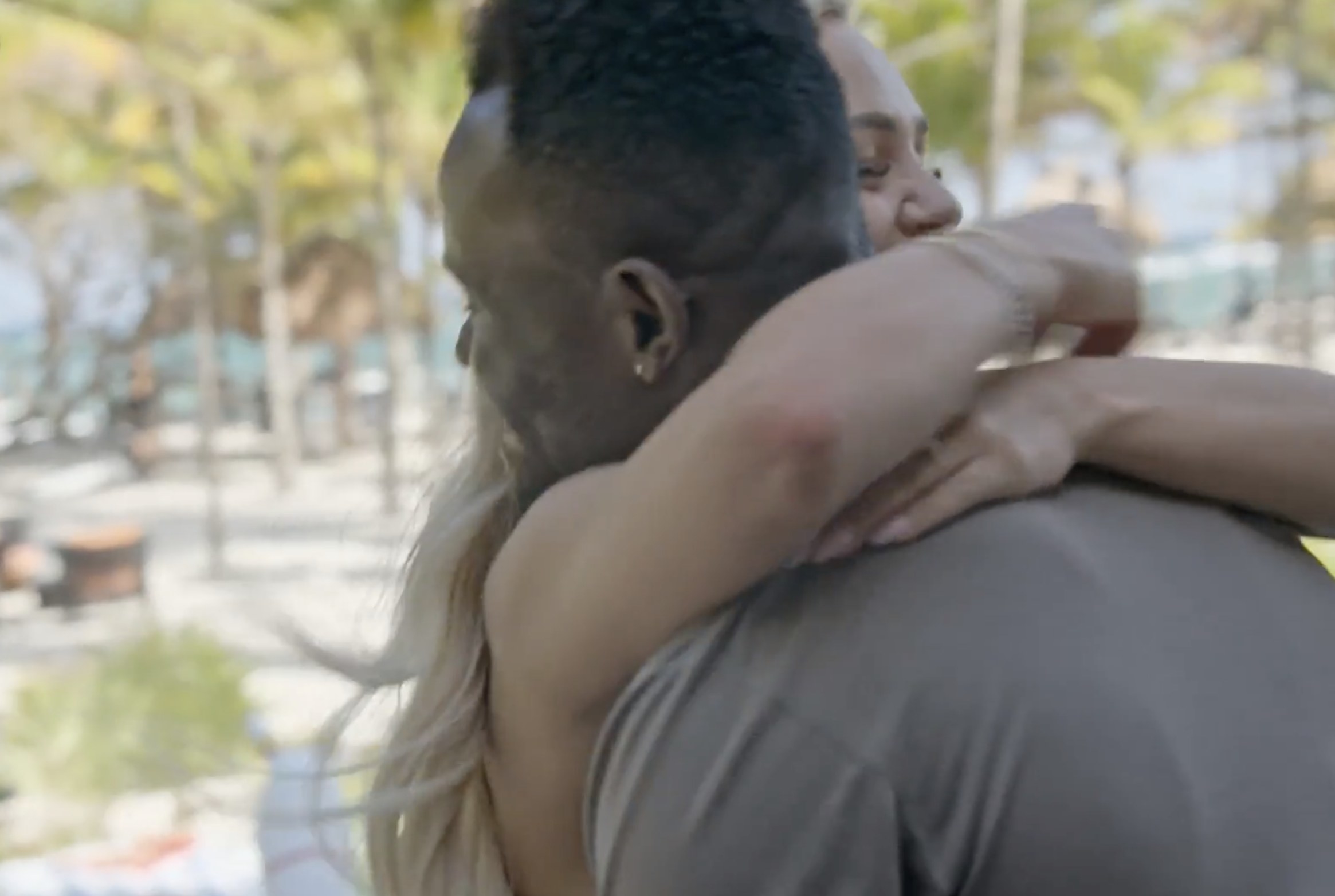 Micah hugs Kwame