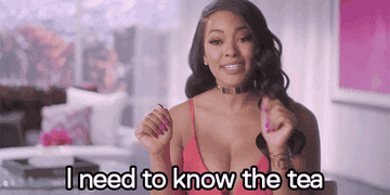 woman saying, i need to know the tea