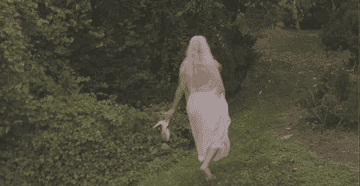 Gigi slips on a muddy embankment and falls in her wedding dress as she&#x27;s running away from the cameras