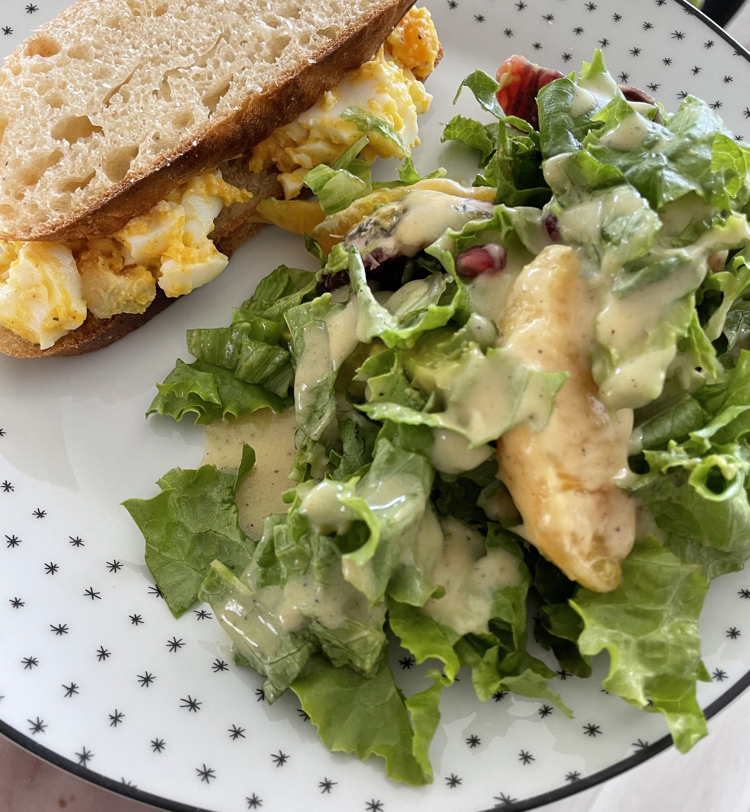 egg salad sandwich and salad on a plate