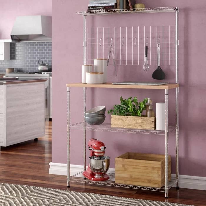 the silver chrome standard baker&#x27;s rack with baking utensils and appliances