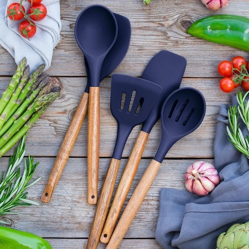 the blue silicone cooking utensils set with spatulas and spoons