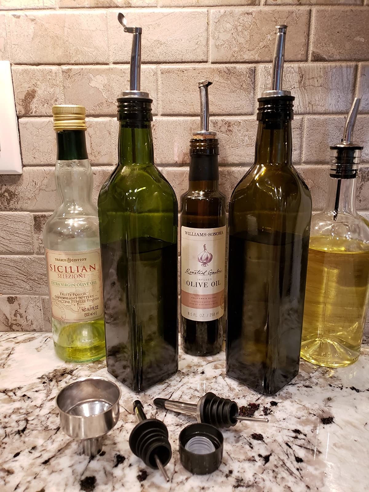Reviewer&#x27;s photo of the olive oil bottle in the color Green
