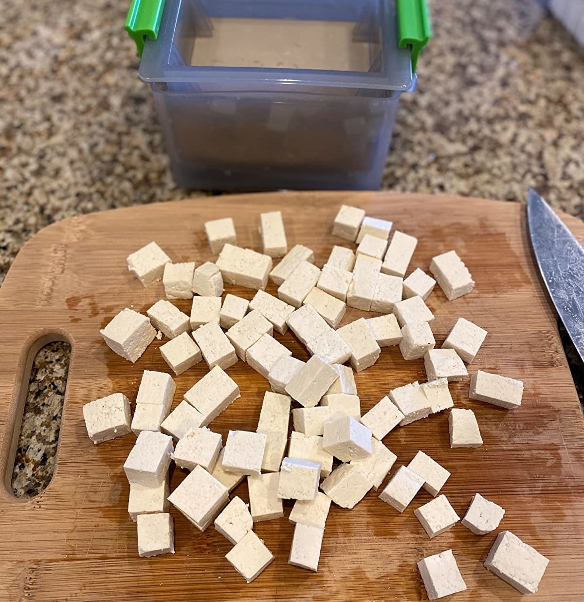 Reviewer&#x27;s photo of diced tofu pressed using the tofu press